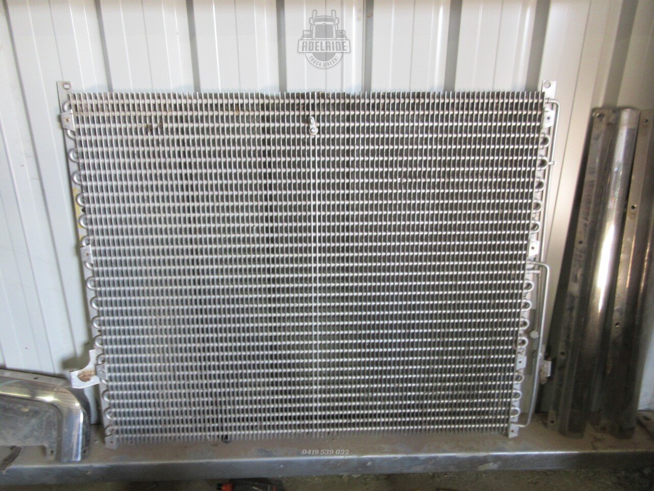 IMG_2738__09602.1723443482.jpg Kenworth Grill & Condensed Surround framing - Wrecking Truck (197) - Image 1